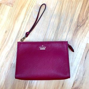Kate spade wristlet burgundy color